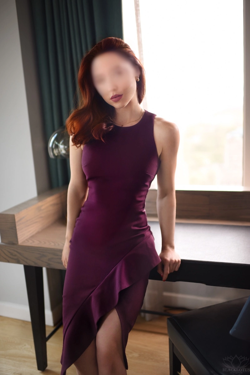 luxury companion in purple cocktail dress